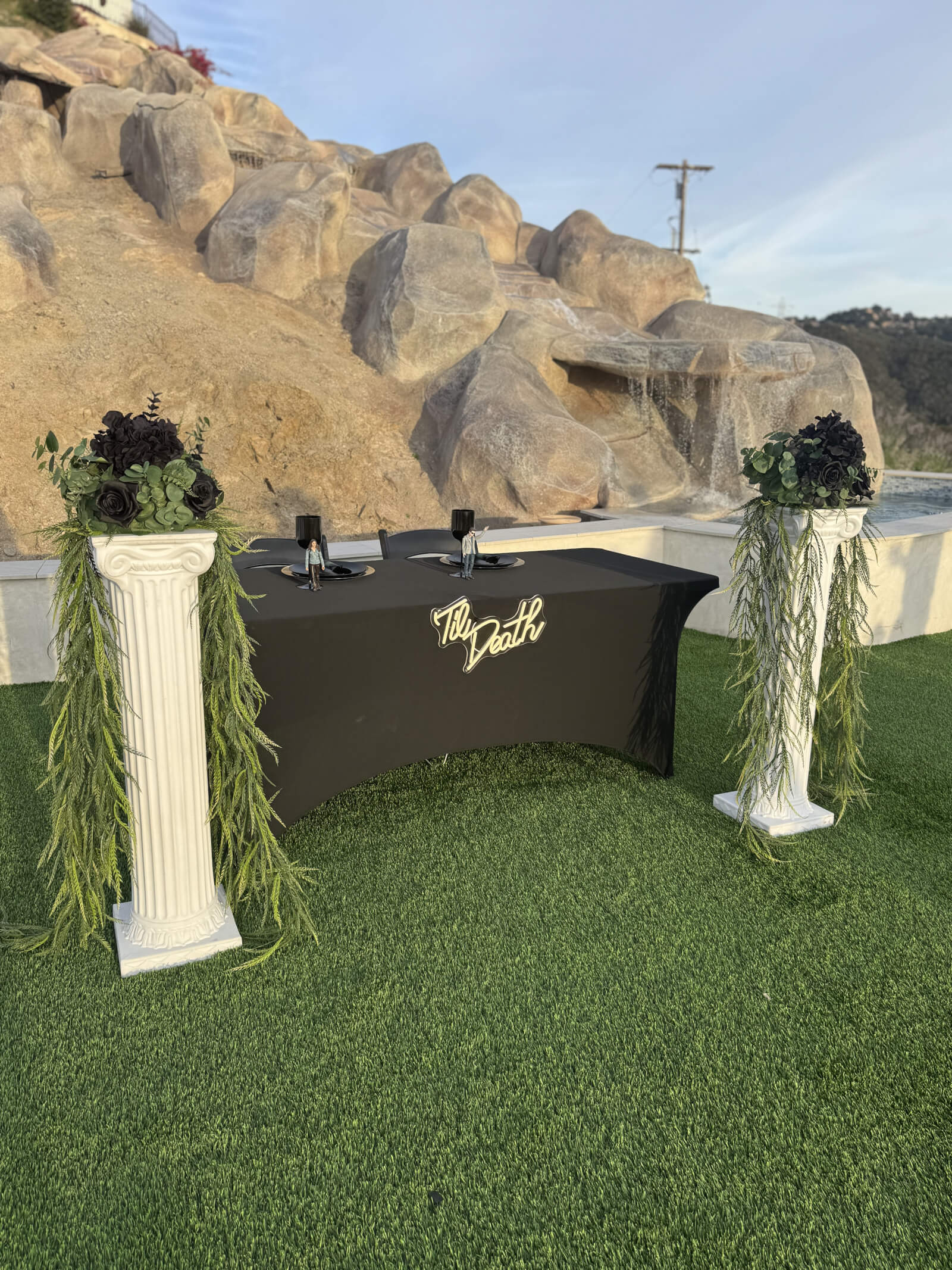 Til Death sweetheart table styled with bold florals and candlelight
